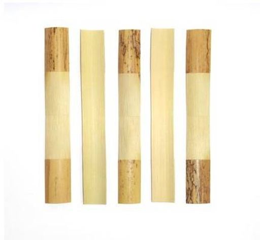 Contrabassoon cane, gouged and profiled.